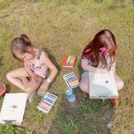 Eleanor and Aubrey, kindergarten, practice open air painting during class.