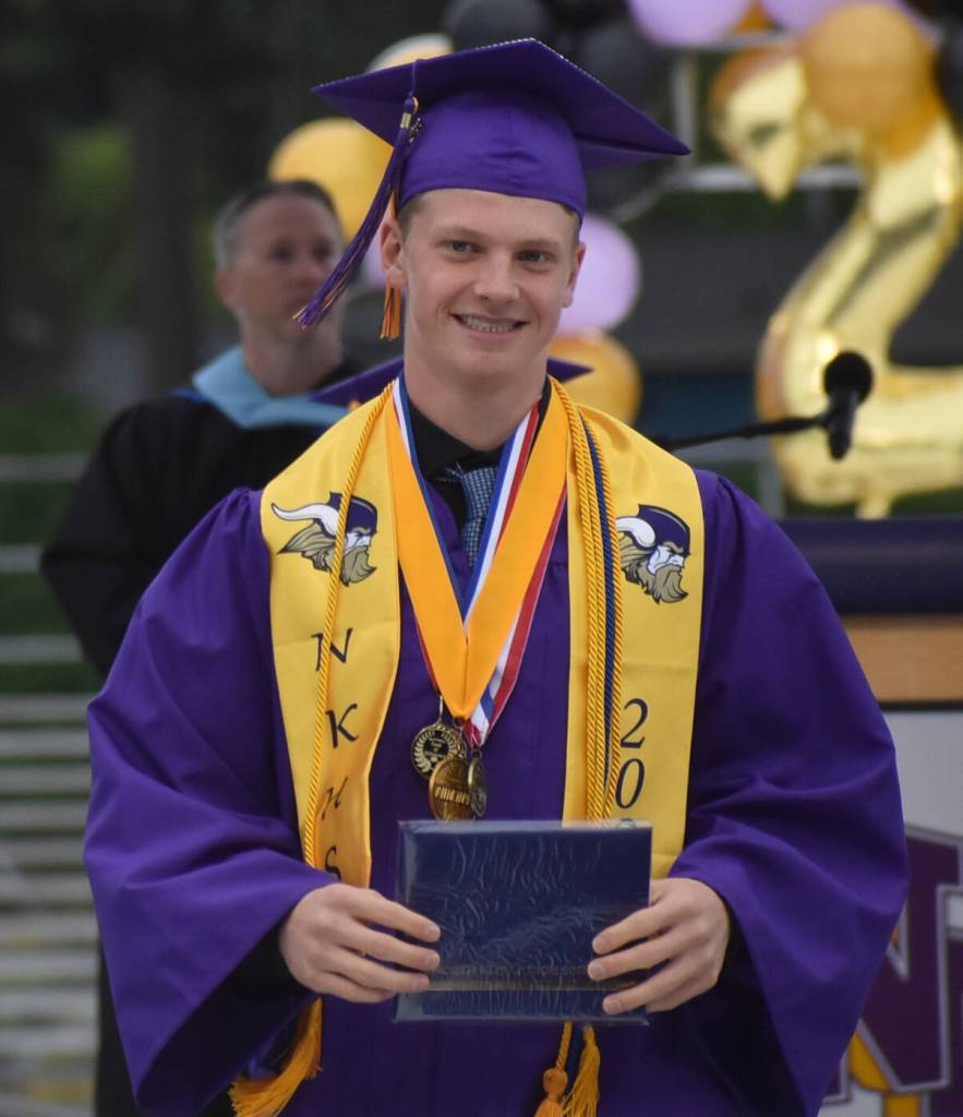 Benen Lawler does a poem that involves every senior that graduated.