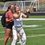Evelyn Beers helps Chris Richardson form the first high school girls flag football team in the county.