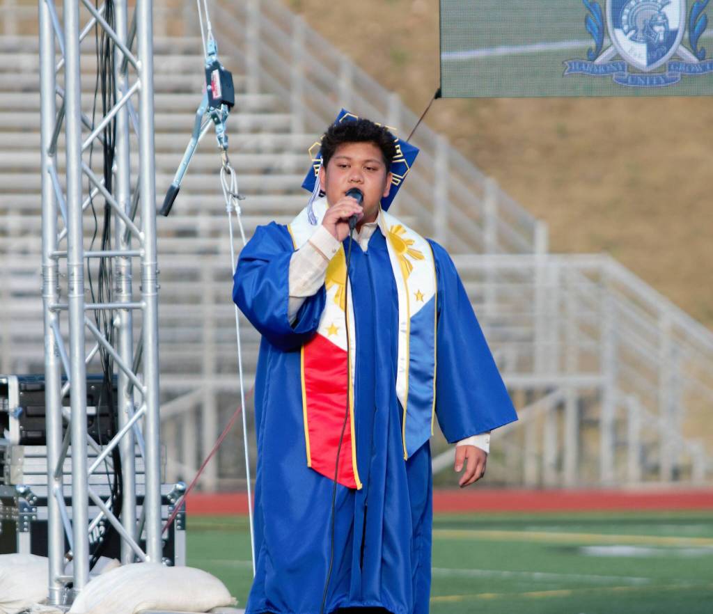 Olympic graduate and student body executive president AJ Fronda performs a soulful solo with the high school jazz choir.