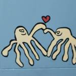 Detail of two enamored octopi on the right side of the piano.