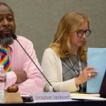 Board president Drayton Jackson addresses the audience prior to public comment.