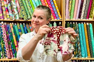 Piper Tupper, owner of Esthers Fabrics on Bainbridge Island, says doll clothes are a great project for beginner sewists. Brenda Jorgens photo