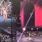 Taylor Swift performs on stage.