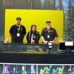 Jared Murphy, left, purchasing manager; Tracy Seachord, budtender; and Derek Christensen, general manager, prepare the store for opening.