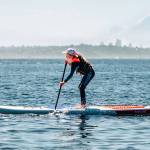 Camlyn Anderson courtesy photo
A camper paddleboards in Puget Sound off Saltair Beach in Kingston.