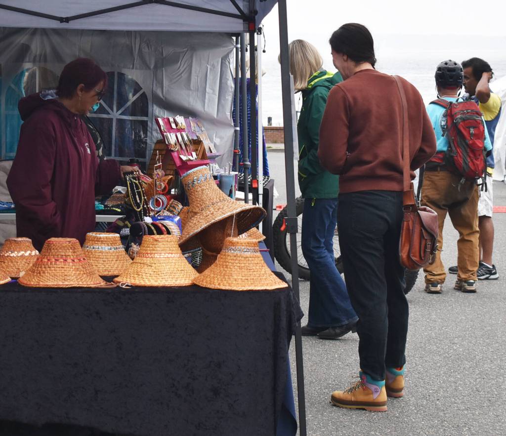 Vendors sell native merchandise and foods to those who attended the event.