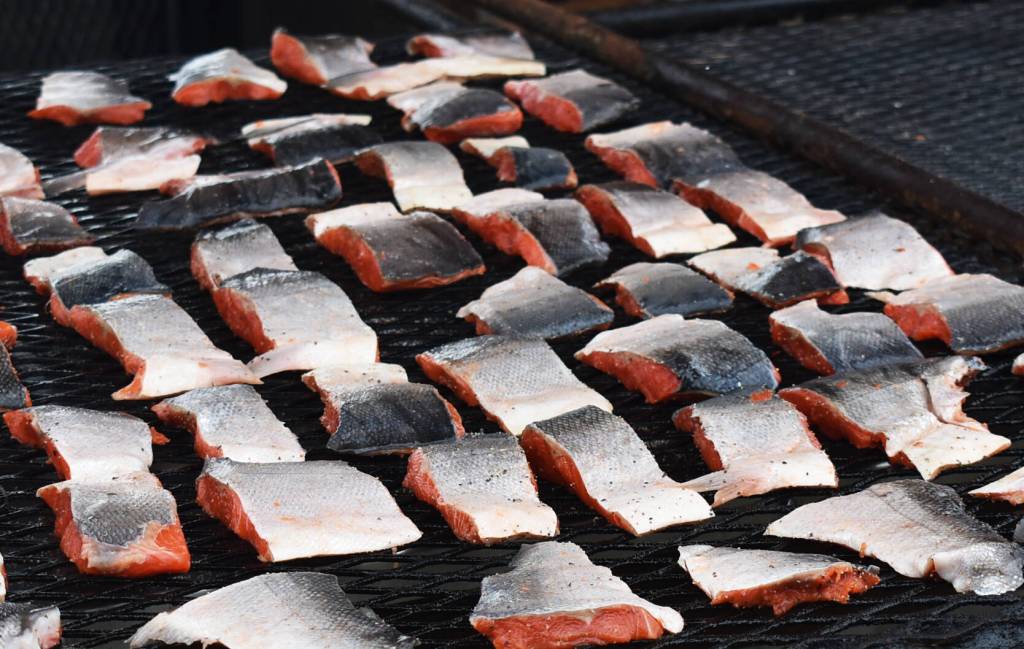 Chief Seattle Days volunteers provide baked salmon meals.