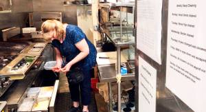 KPHD courtesy photos
Kitsap Public Health District inspector Susan Van Ort does food safety inspections at restaurants to ensure food is prepared and stored under sanitary conditions.