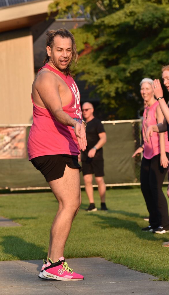 Josh Masters, Island Fitness instructor, leads an outdoor Zumba Dance for Maui fundraiser to benefit Maui-Strong. Masters mentor and instructor lost his Lahaina business in the fires.