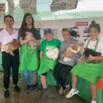 (left to right) Madeleine (13), Emily (14), Brody (10), Liam (12), and Harrison (11) pose for a picture with their birds.