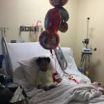 Sydney Callands lies in a hospital bed recovering from her stroke.