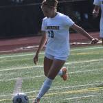 Bainbridges Riley Becker scores on a free kick to give the Spartans the lead.