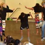 Dancers perform the Warriors Dance at the assembly.