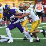 Nicholas Zeller-Singh/Kitsap News Group Photos
NKs Lelond Anderson fights for extra yards before scoring a touchdown.