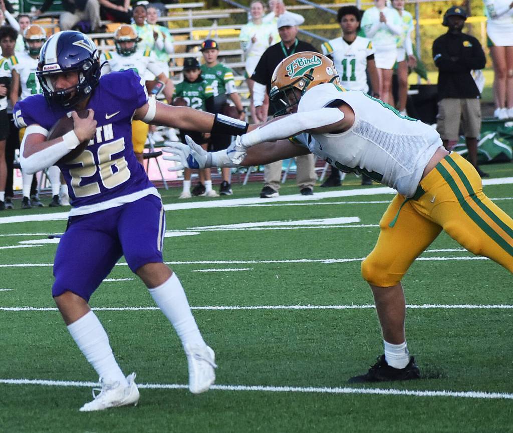Carter Dungy scores a touchdown on the ground for the Vikings.