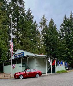 Nancy Treder/Kitsap News Group
The American Legion Colin Hyde Post 172 on Bainbridge Island flew the American flag at half-staff to commemorate Patriot Day in honor of the first responders and civilians who died or were wounded on Sept. 11, 2001, and the POW/MIA flag for military personnel who were prisoners of war or missing in action.