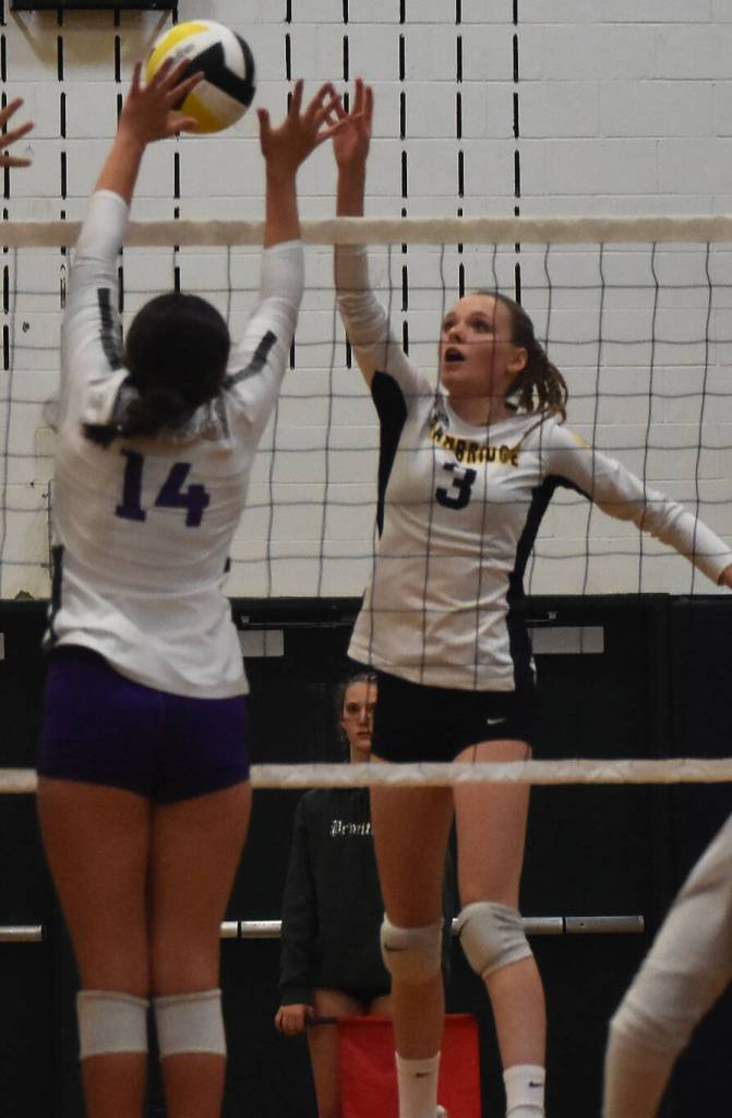 Bainbridges Jameson Payne battles North Kitsaps Teegan DeVries at the net.