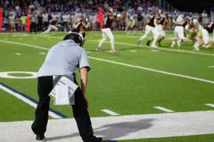 Elisha Meyer/Kitsap News Group
South Kitsap head coach Sean Banks watches his offense go to work against Puyallup.