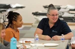 Elisha Meyer/Kitsap News Group
Kimberly Adams (right) leads her group of kids in some icebreaker introductions during the first session of Sibshops.