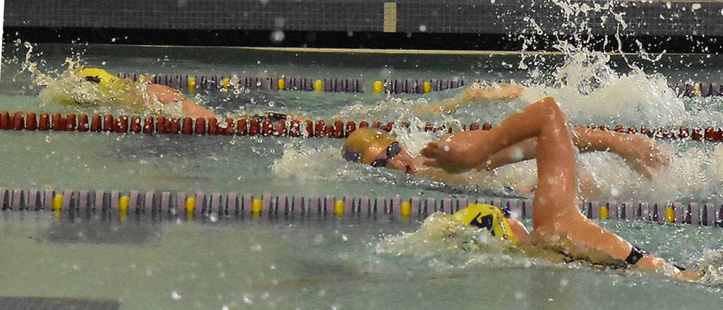 Swimmers from Bainbridge and North Kitsap race toward the finish line in a freestyle event. BHS won the meet 130-55.