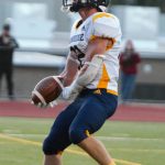 Spartan running back Garrett Goade gets pumped up after finding the end zone.