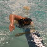 Kingstons Lilia Manges wins the 100-yard freestyle.