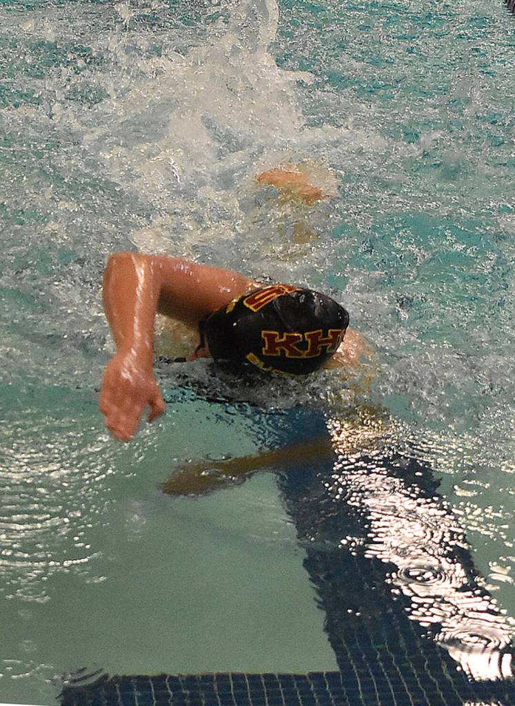 Kingstons Lilia Manges wins the 100-yard freestyle.