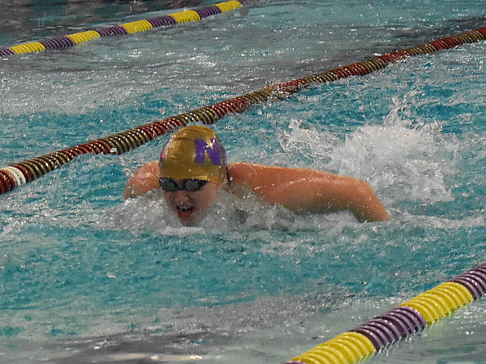 Viking Izzy Cera competes in the 200-yard medley and 200-yard freestyle relay.