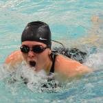 Kingstons Tegan Stanford competes in the 100-yard freestyle.