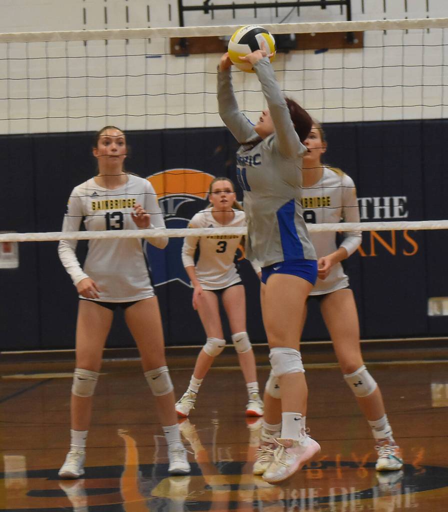 Trojan Josselyn McGarrah sets up her teammates.