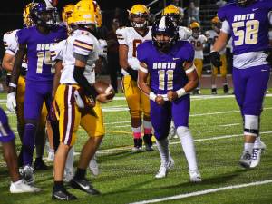 Nicholas Zeller-Singh/Kitsap News Group Photos
Viking Ben Gomez flexes his muscles after a big tackle.