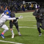 Nicholas Zeller-Singh/Kitsap News Group Photos
Viking Cohen Meis runs down the sideline for a first down.