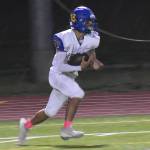 Kenneth Najera returns the opening kickoff for the Knights.