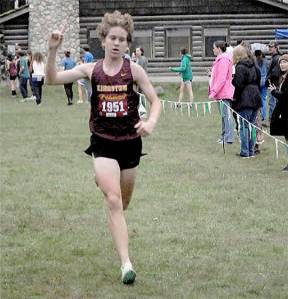 Keith Thorpe/Olympic News Group Photos
Lucas Lenz of Kingston shows that he is finishing first as he crosses the finish line at the Olympic League Championships in Port Angeles Oct. 19.
