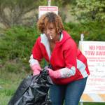Monica Little helps Shari (out of picture) pick up around the Bravo Terrace encampment days before it is blocked off by the city of Port Orchard.