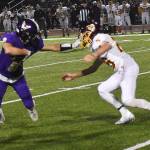 Nicholas Zeller-Singh/Kitsap News Group Photos
Logan Sloman helps push the momentum into NKs favor.