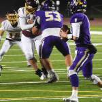 NKs Cole Edwards scrambles for a touchdown.