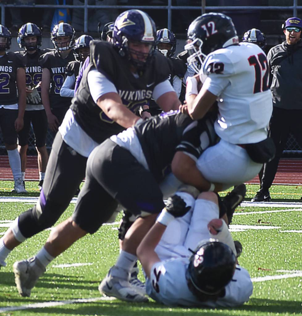 EJ Vailolo of NK drives the Ephrata quarterback into the ground.