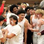 Elisha Meyer/Kitsap News Group Photos
Senior Kenny Miller smiles as the South Kitsap students celebrate on the court.