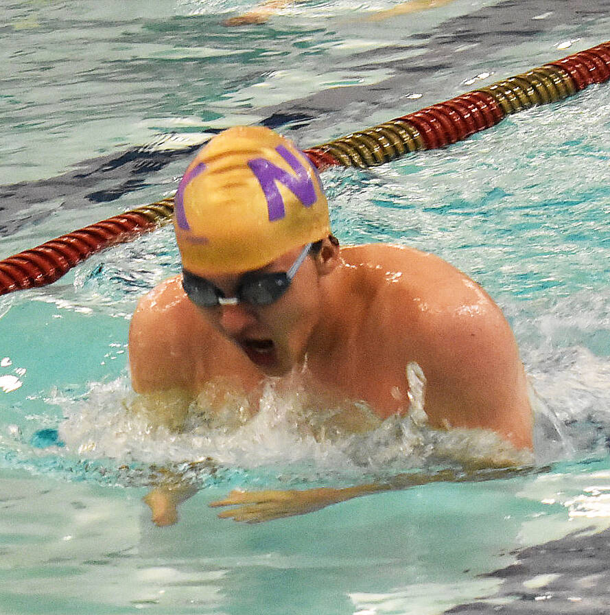 Viking Levi McClain leads the relay teams to first-place finishes.