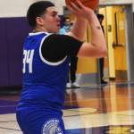 Olympics Noah Shaw shoots a three-pointer.