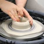 Elisha Meyer/Kitsap News Group Photos
The hands of Jacob Cowan shape the clay on a spinning wheel in his new pottery studio in Port Orchard.