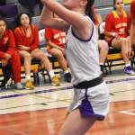 Avery Kline scores a fastbreak layup for the Vikings.