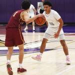 Buc Rhys Hernandez sizes up Viking Jordan Williams while playing defense.