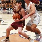 Buc Torsten Goller tries to back down Viking Mason Chmielewski.