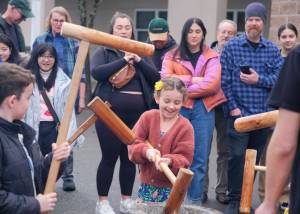 Damon Williams/Kitsap News Group Photos
Mallets are used to smash down the rice into dough.