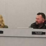 Councilmembers Heidi Fenton and Eric Worden listen to Mayor Rob Putaansuu at the Jan. 9 council meeting.