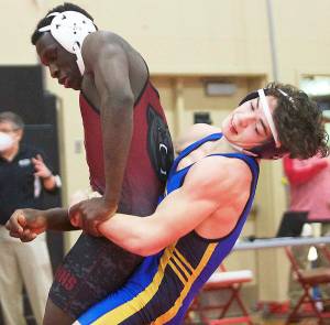 File Photo
Garrett Goade wins the Island Invitational at 175 pounds.