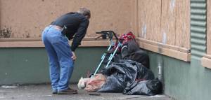 Elisha Meyer/Kitsap News Group
A conversation with a homeless person near the Salvation Armys seasonal shelter.